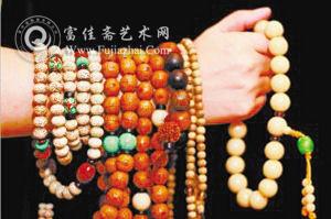 一顆蜜蠟老珠三年漲價(jià)9倍多 珠子假貨居多